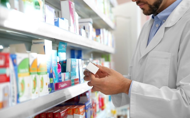 professional pharmacist medicine drugstore closeup