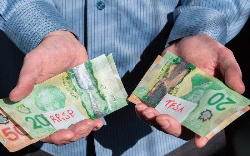 close-man-hands-holding-canadian-cash rrsp tfsa investments
